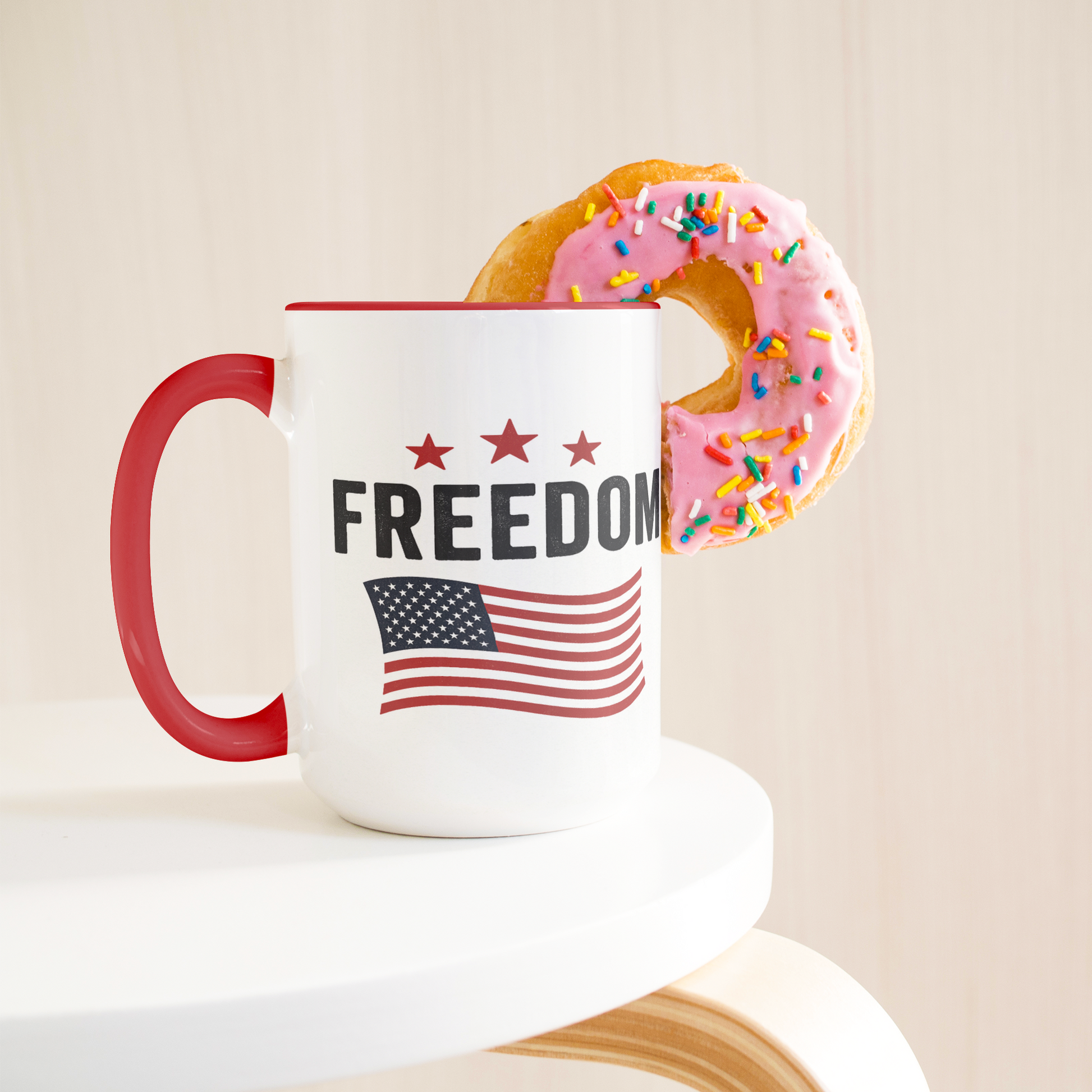 Freedom_15oz_Patriotic_Mug_Lifestyle_Donut_LH_Mockup.png
