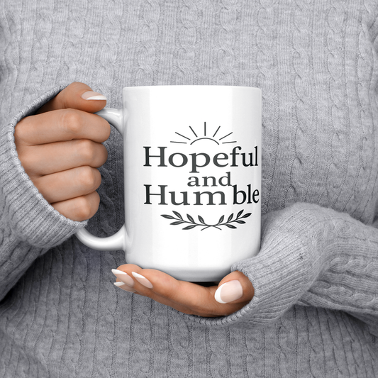 Hopeful_and_Humble_Mug_15ozWhiteMugLifestyleLHChest_Mockup.png