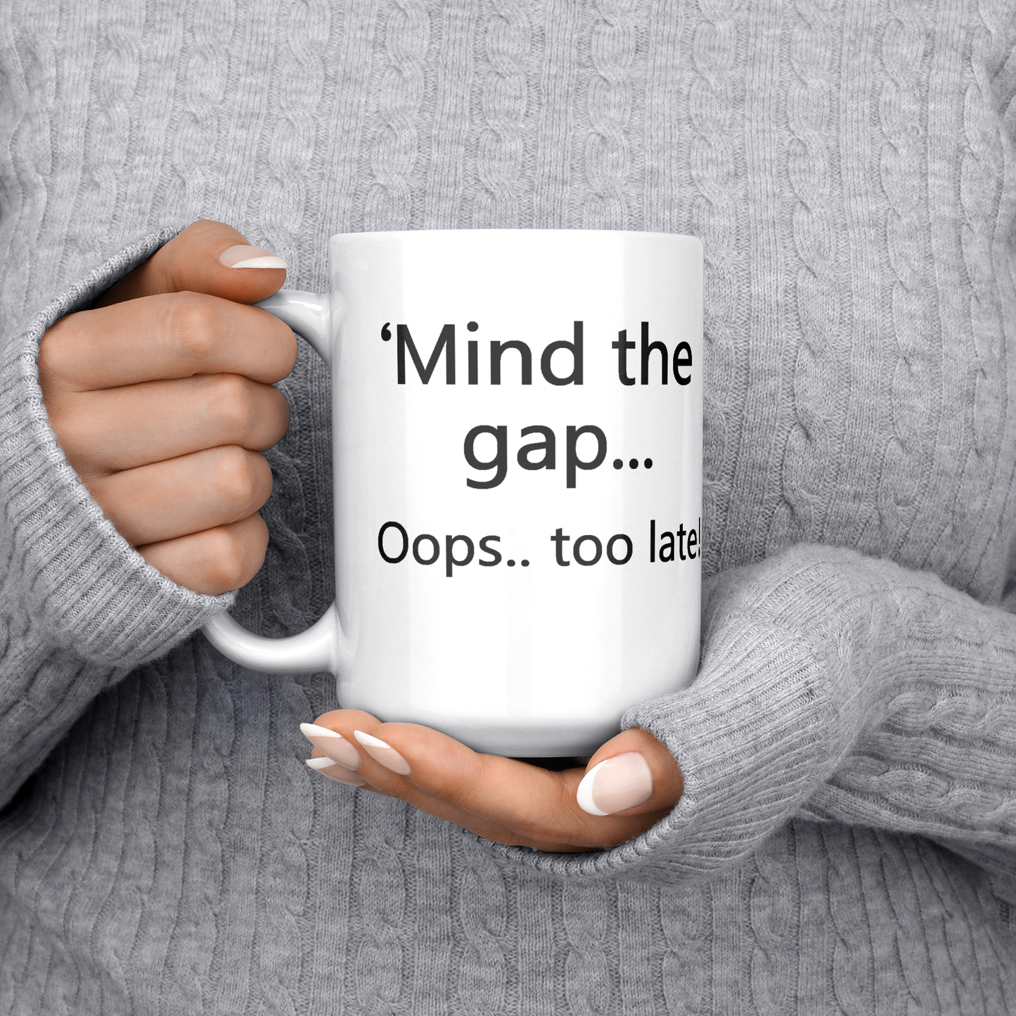 Mind_the_Gap__Oops_Too_Late_Funny_Br_15ozWhiteMugLifestyleLHChest_Mockup.png