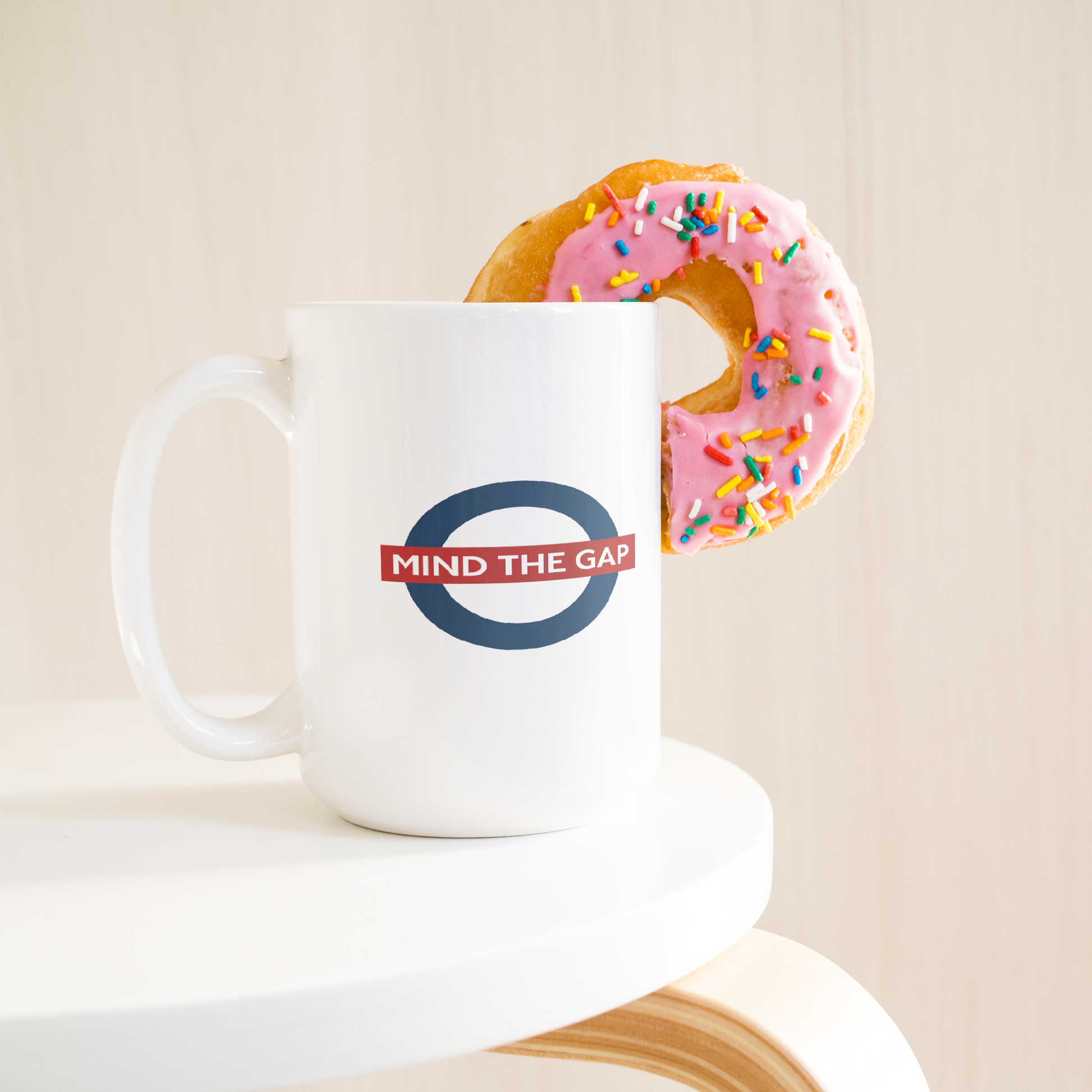 Mind_the_gap_humorous_British_saying_mug_15ozWhiteMugLifetsyleDonutLH_Mockup.png