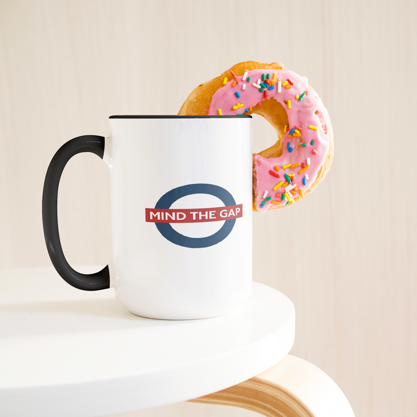 Mind_the_gap_humorous_British_saying_mug_Lifestyle_Donut_LH_Mockup.png