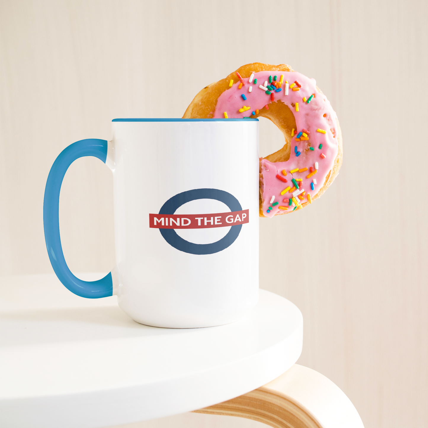 Mind_the_gap_humorous_British_saying_mug_Lifestyle_Donut_LH_Mockup.png