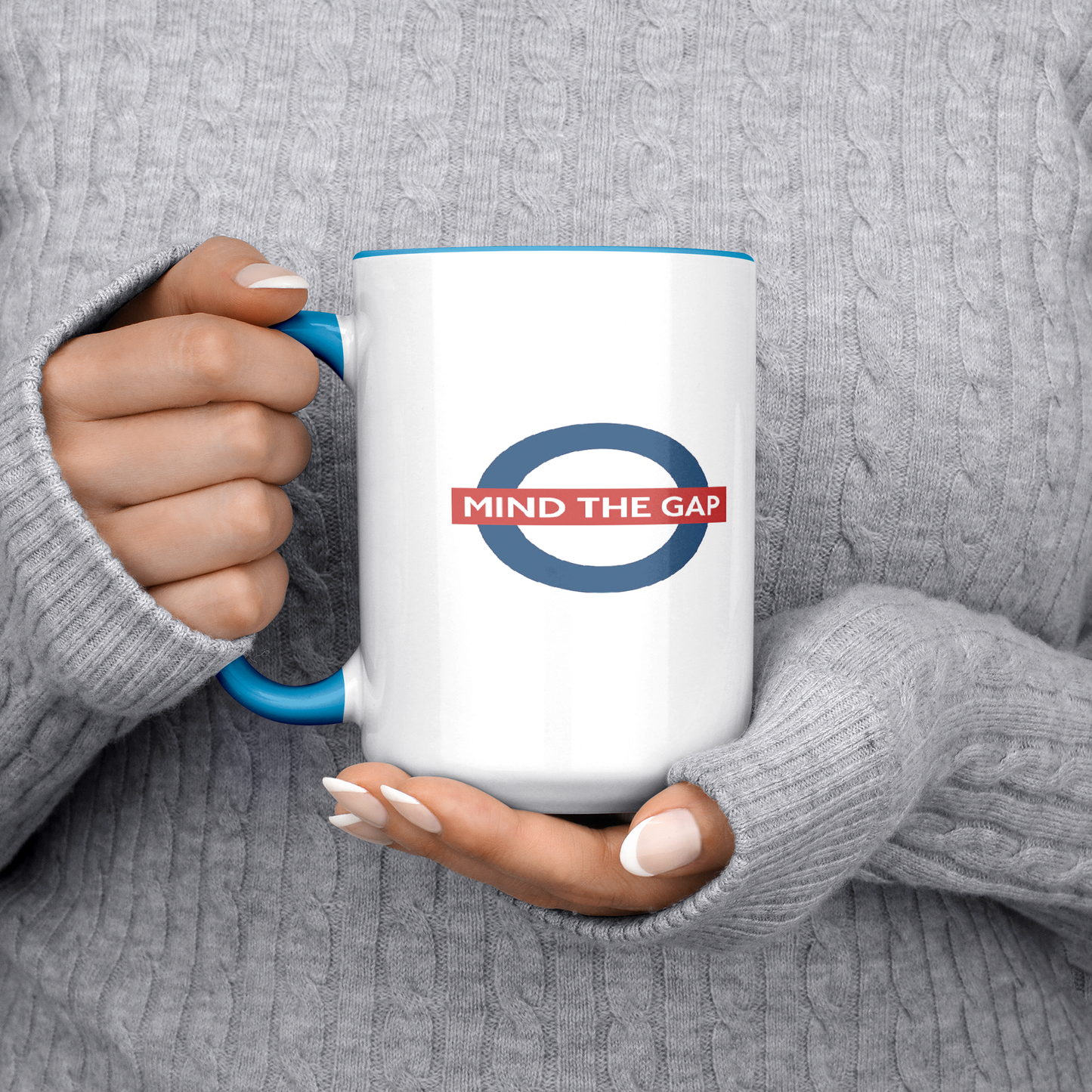 Mind_the_gap_humorous_British_saying_mug_Lifestyle_LH_Chest_Mockup.png