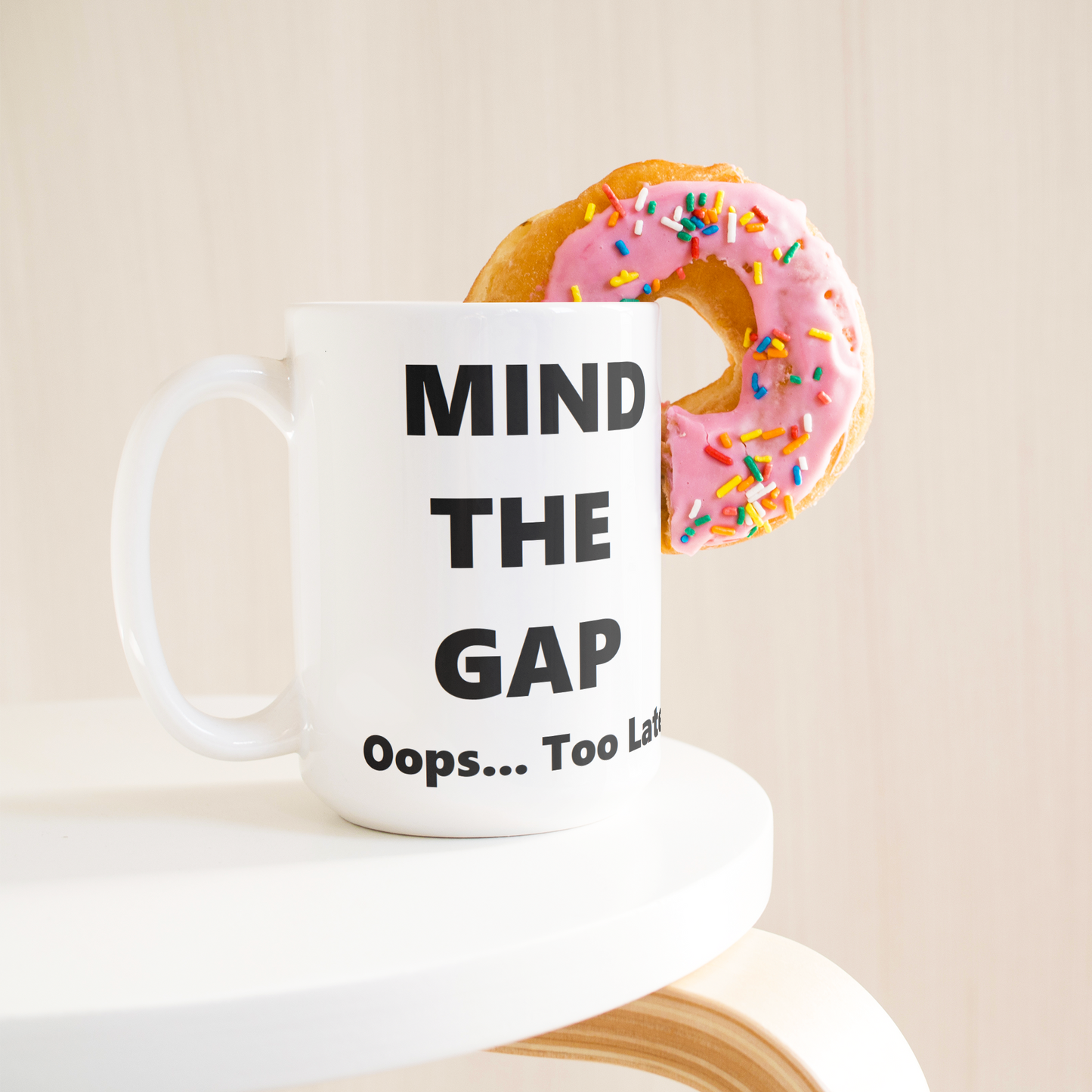 Oops_Too_Late_-_British_Humorous_Mug_15ozWhiteMugLifetsyleDonutLH_Mockup.png